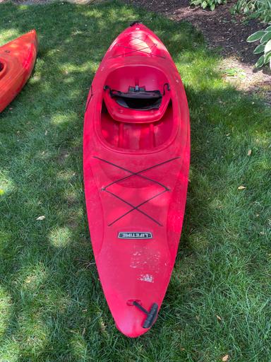Photo of Red Lifetime kayak. 